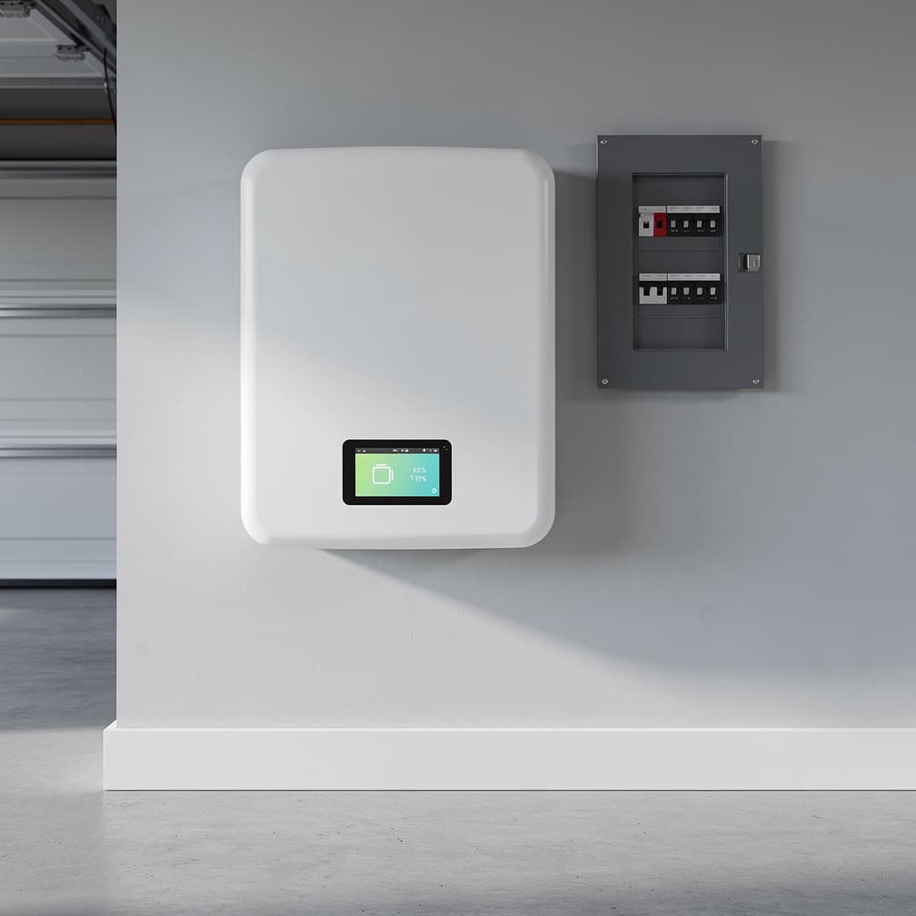 Home battery storage unit mounted on garage wall